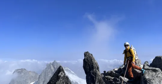 Advanced mountaineering student in big alpine terrain
