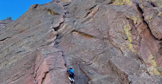A climber on the Bastille Crack in Eldorado Canyon Colorado