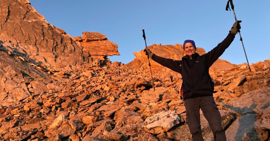 A climber at the Keyhole on Longs Peak in Rocky Mountain National Park at sunrise