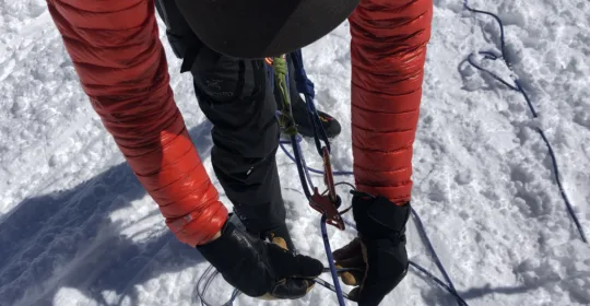 Crevasse rescue student practicing hitches in Golden Colorado