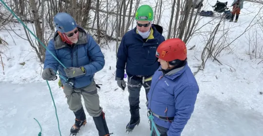 Ice climbers reviewing belaying at the Lake City Ice Park