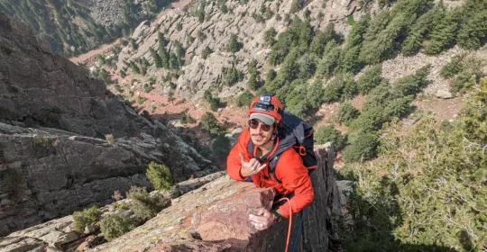 A rock climber on Rewritten in Boulder Colorado