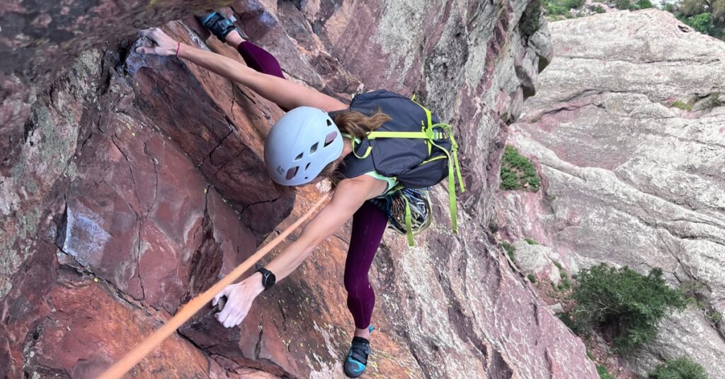 A rock climber on the Upper Ruper Traverse in Eldorado Canyon State Park Colorado