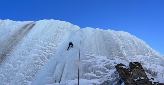 A student in the steep ice climbing course working on technique in Colorado