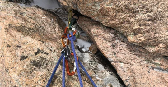 Technical ropework for mountaineering anchor in Colorado