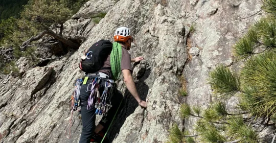Technical ropework for mountaineering student learning how to shorten the climbing rope in Boulder Colorado