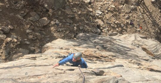 A beginner rock climber in Clear Creek Canyon in Golden Colorado