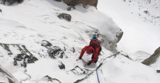 A climber working on mountaineering skills on a privately guided mountaineering trip in Colorado