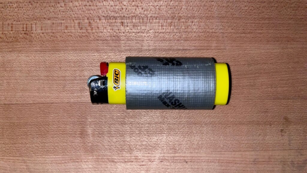A lighter and duct tape in a backcountry ski repair kit