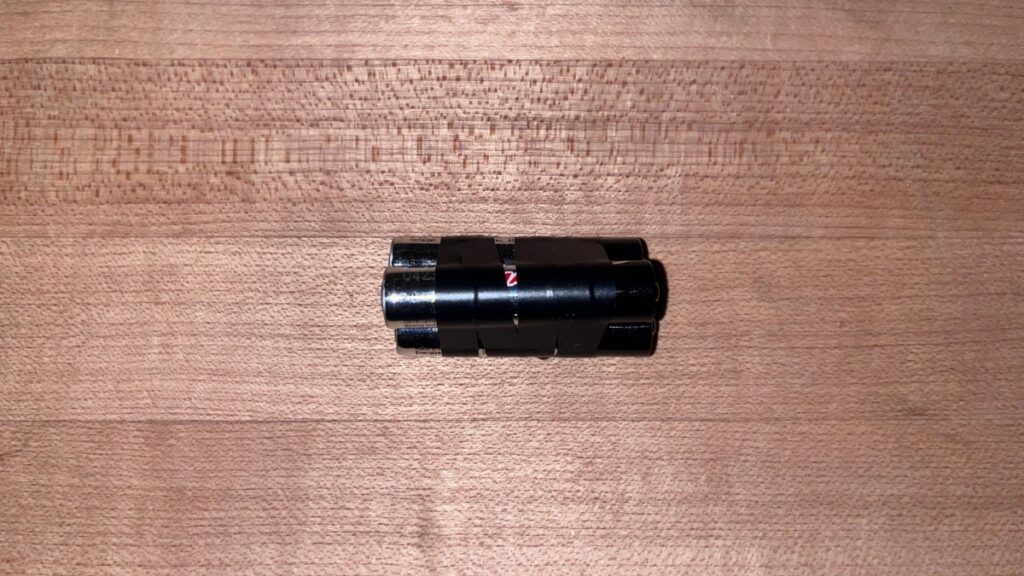 Spare AAA batteries in a backcountry ski repair kit