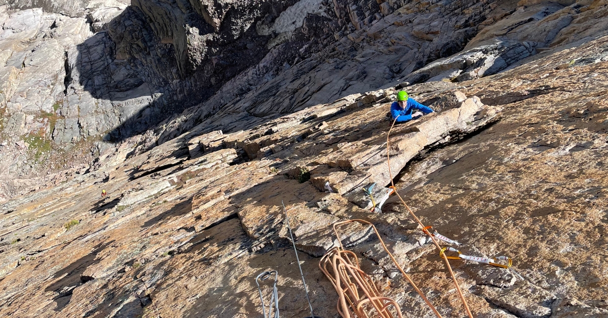 A rock climber on Pervertical Sanctuary on the Diamond Face of Longs Peak