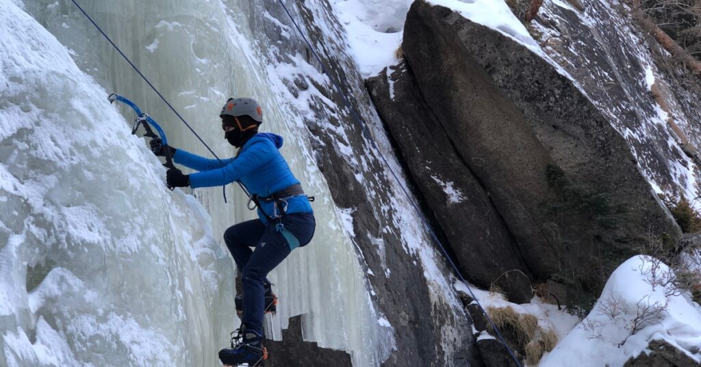 A beginner ice climber learning the ropes in Rocky Mountain National Park