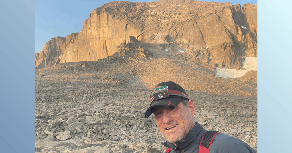 Climber approaching the cables route on longs peak